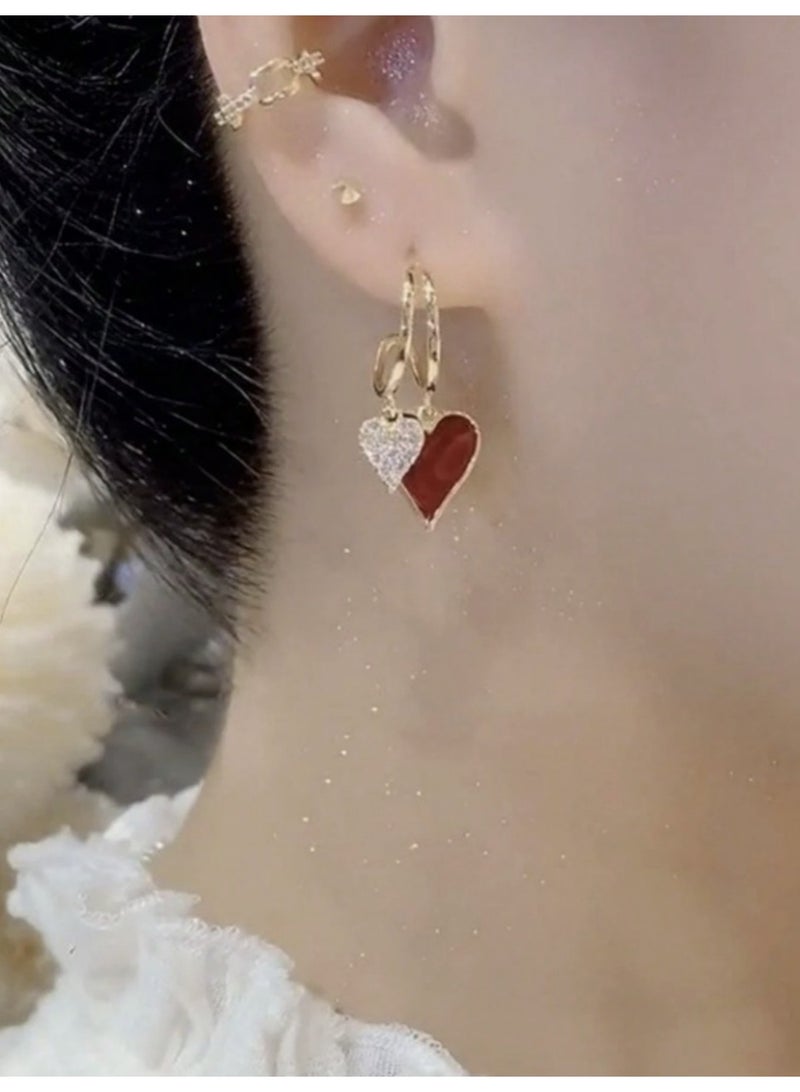 ڤيا أقراط نسائية راقية بتصميم قلب مزدوج، تجمع بين اللمعة الفاخرة والأناقة الناعمة لتمنحك إطلالة رومانسية تلفت الأنظار في كل مناسبة. - Image 1